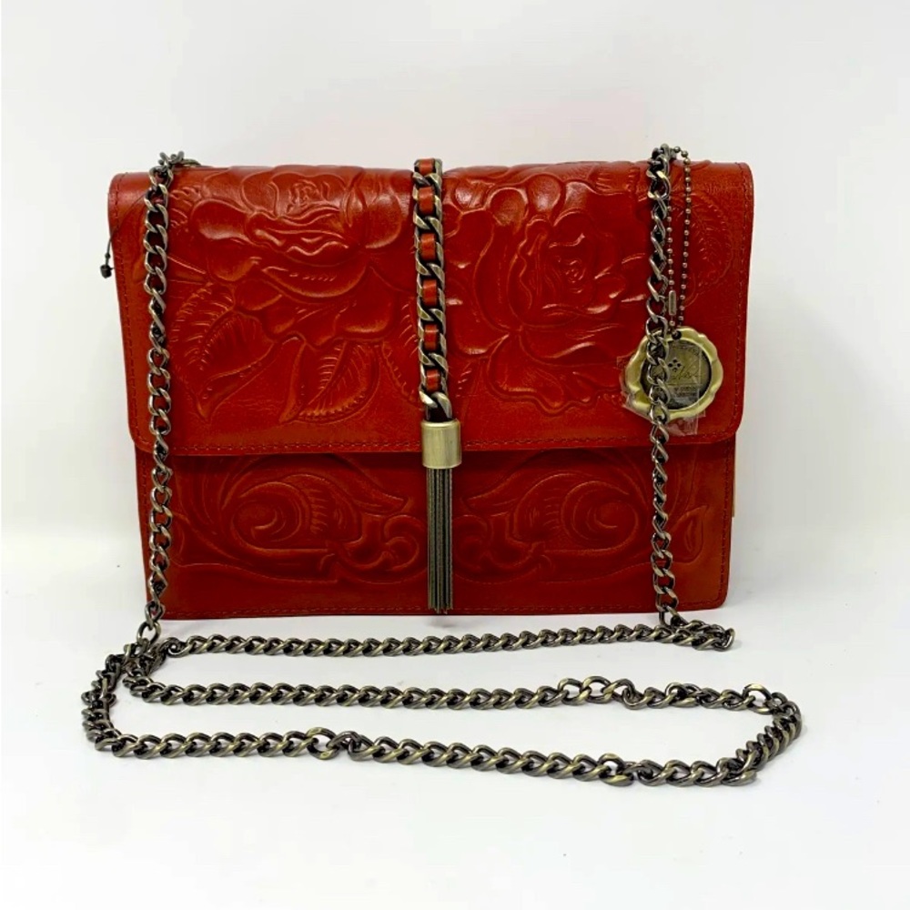 Beautiful Patricia Nash purse with chain strap and chain tassel